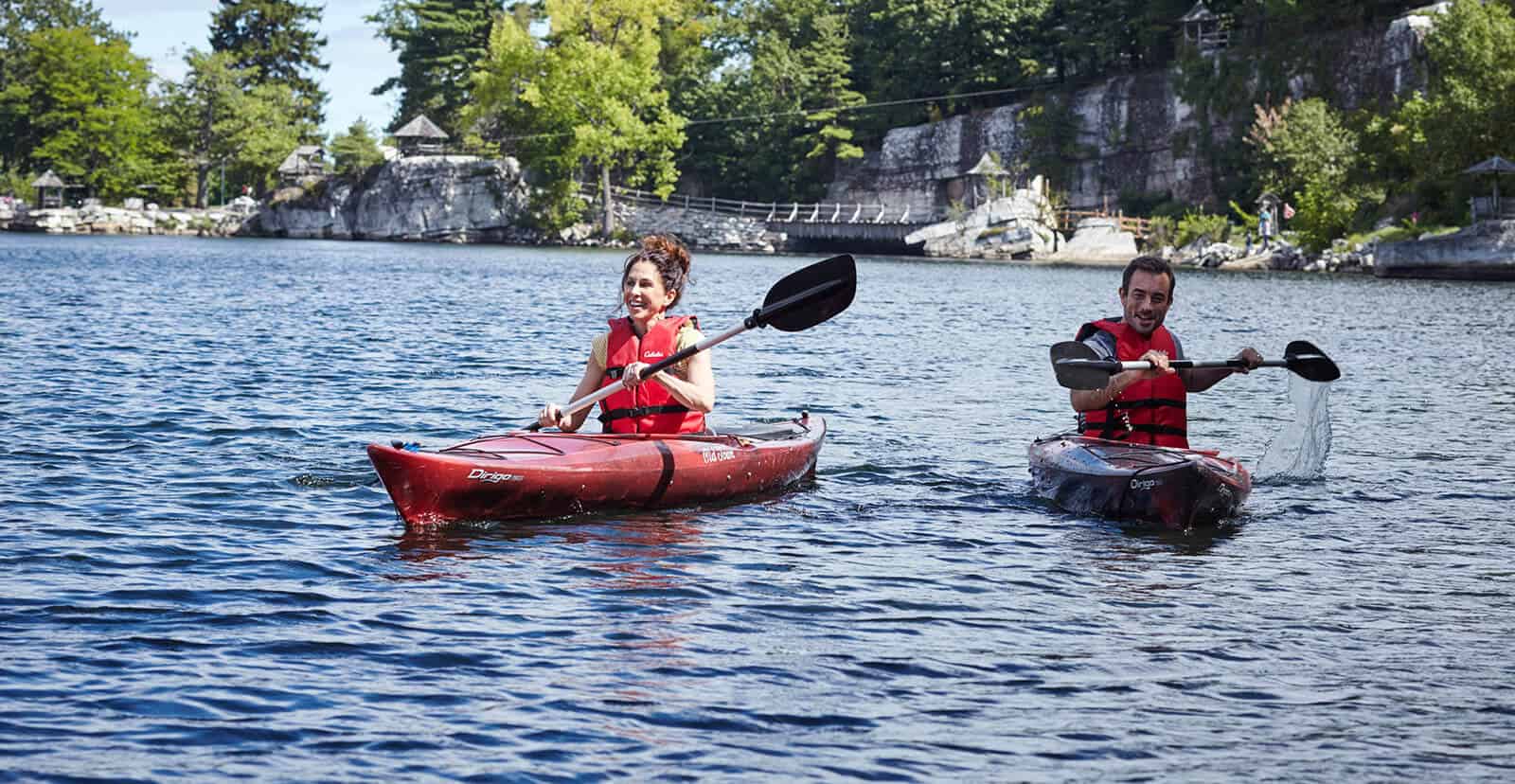 Couple kayaking on lake