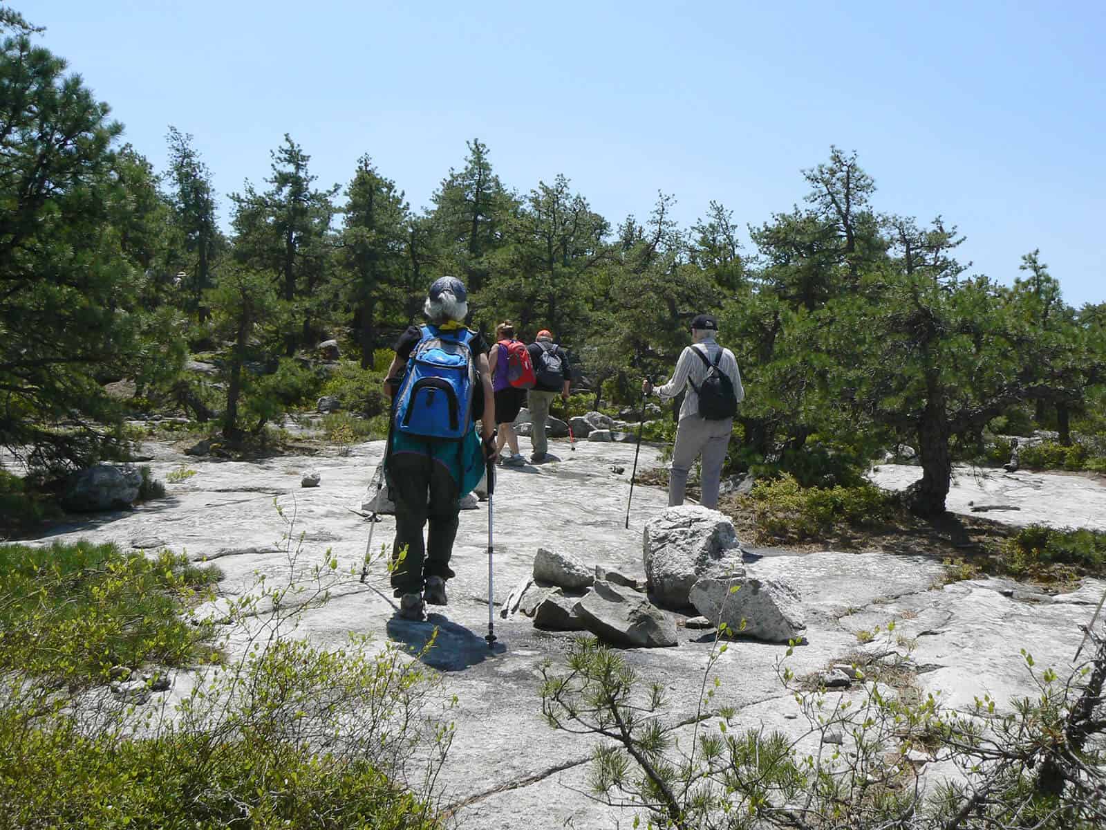 People hiking on rocks
