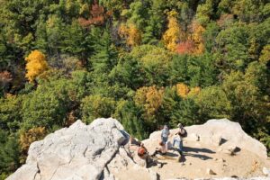 People hiking on rocks