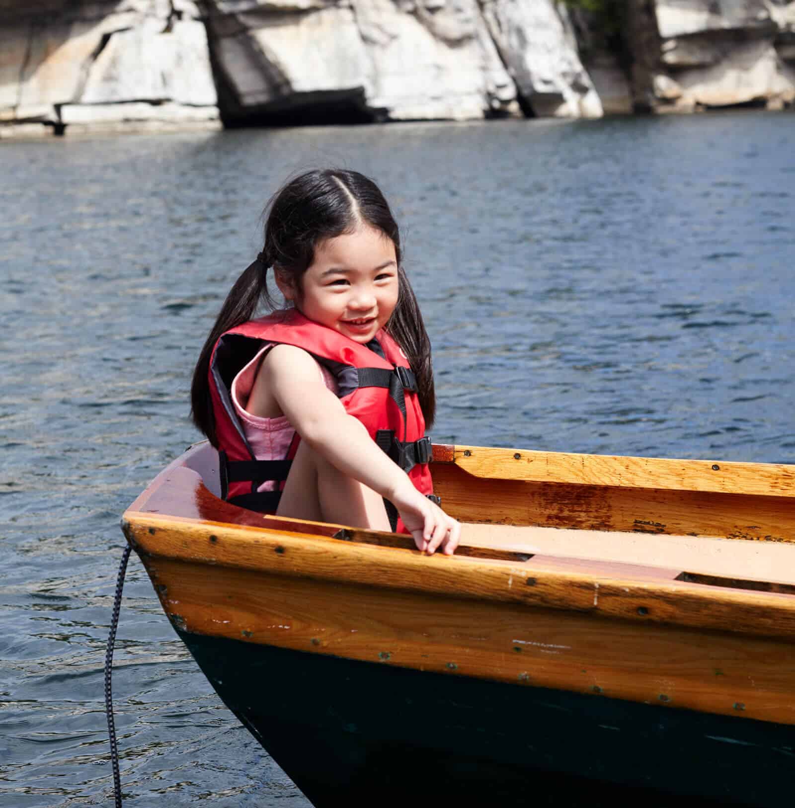 Young girl in row boat