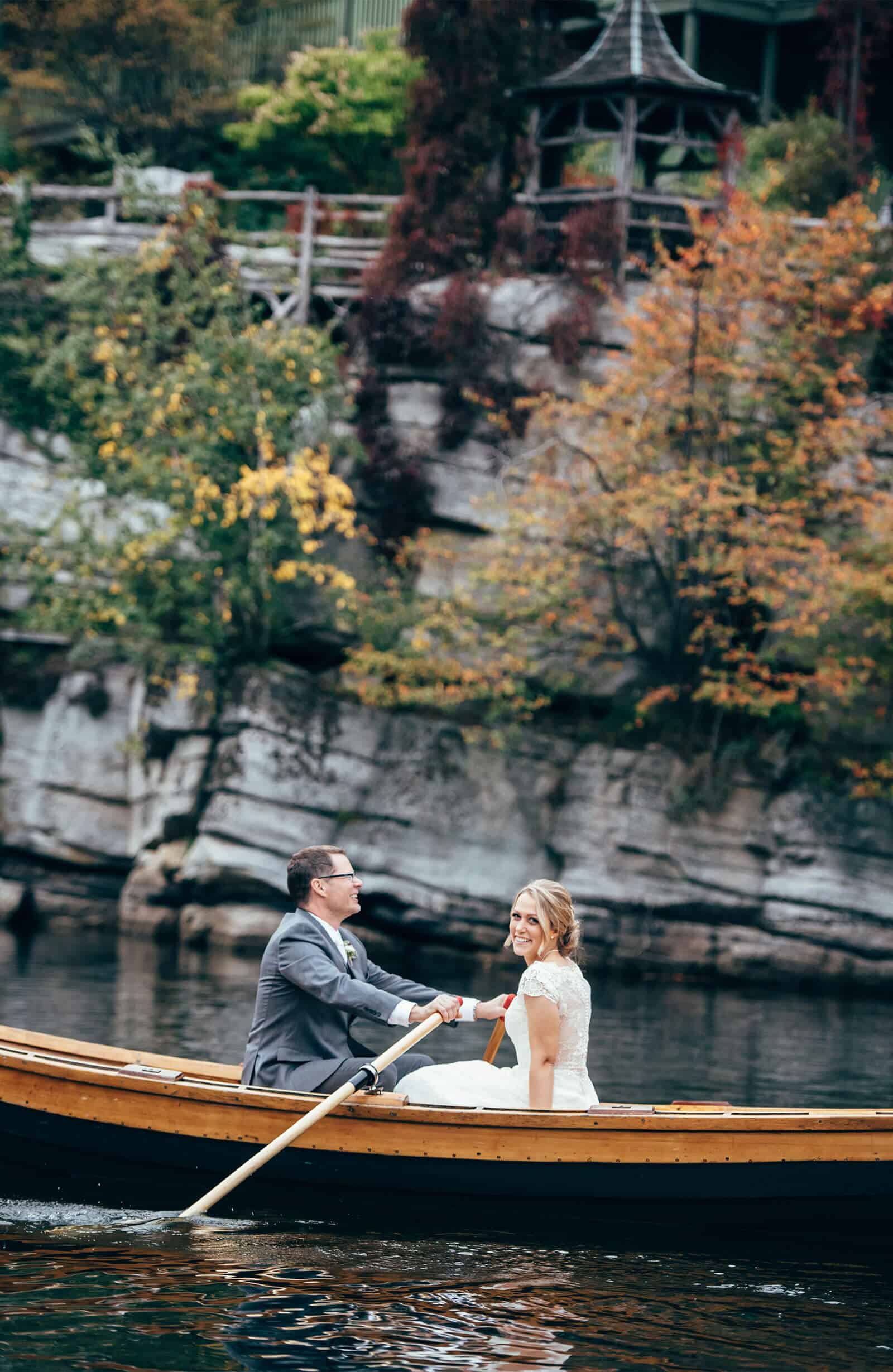 Bride and groom in Canoe on Mohonk lake
