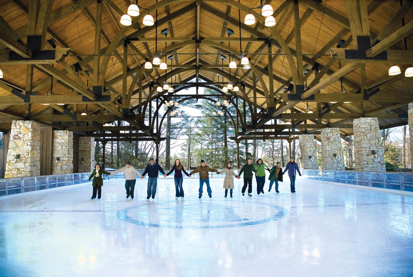 group ice skating in pavilion