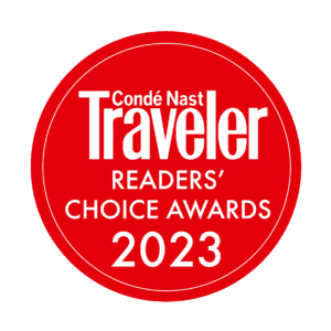 Circular red logo that states Conde Nast Traveler Readers Choice Award 2023