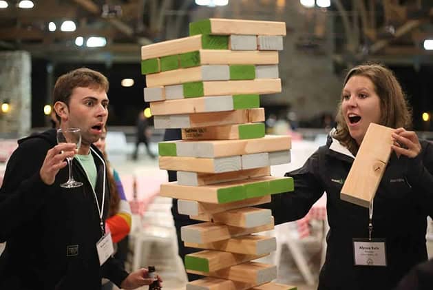 Coworkers Playing Jenga on a Team Building Retreat