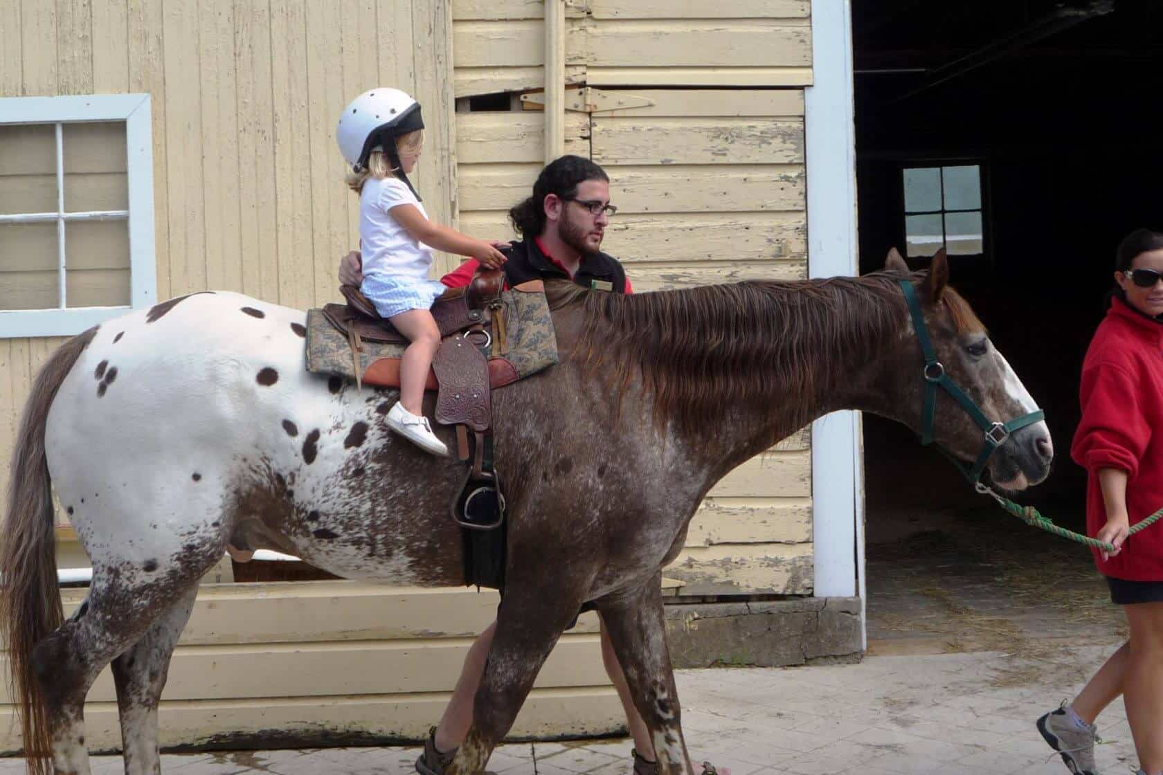 Child Enjoying a Pony Ride at Our Historic Catskills Resort
