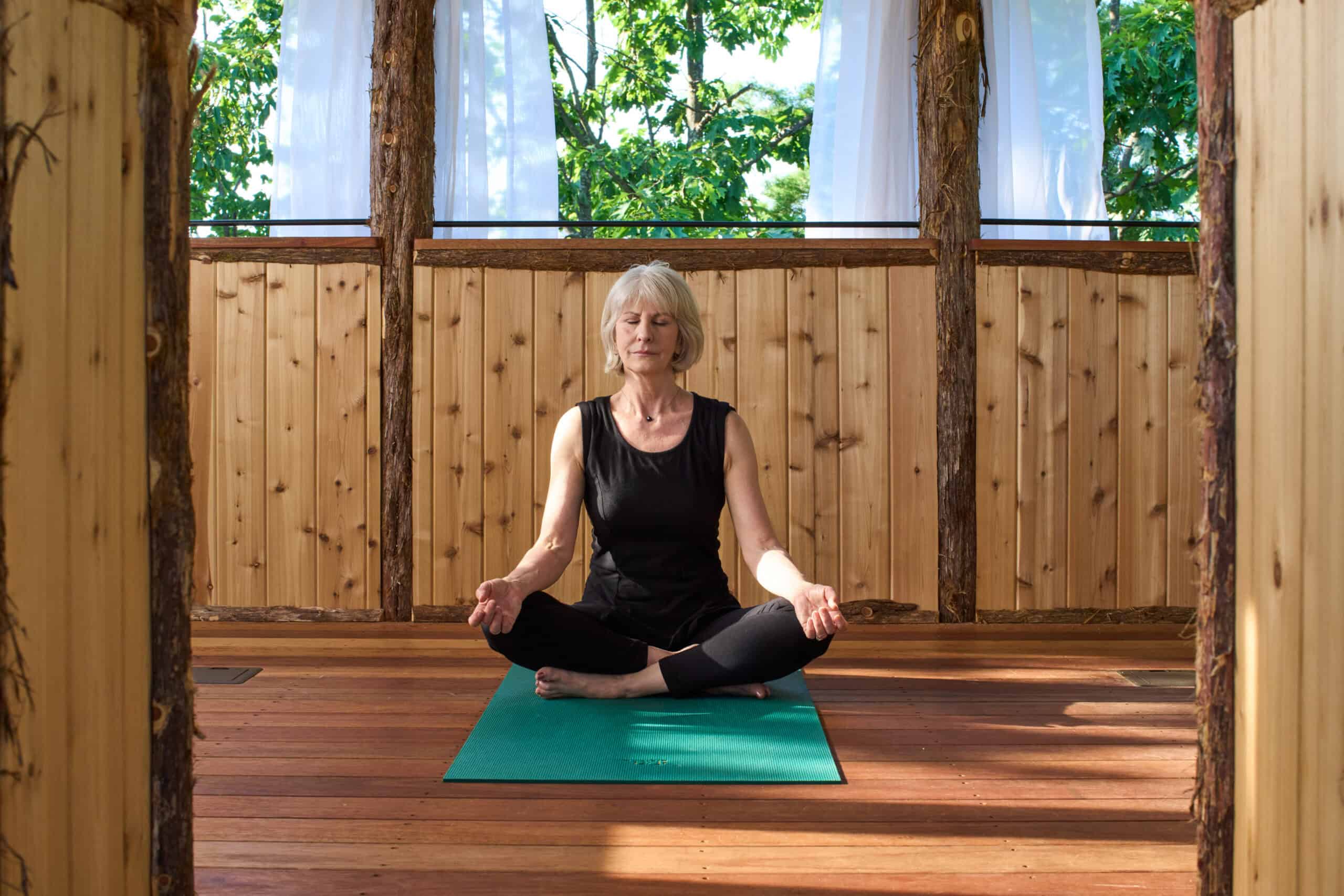 Woman Meditating in Our Hudson Valley Spa Resort