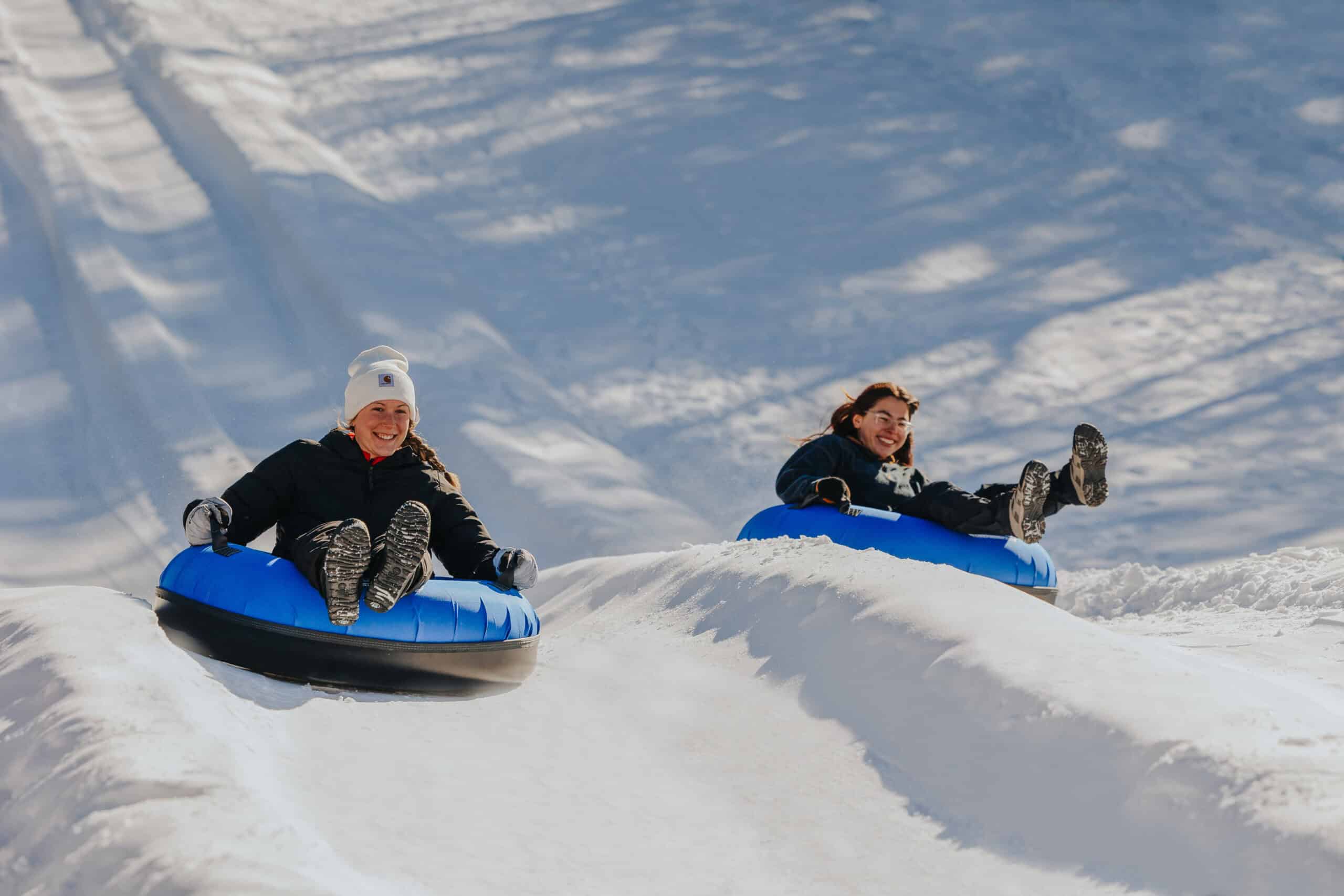 People Snow Tubing During Their Winter Getaway to Upstate NY