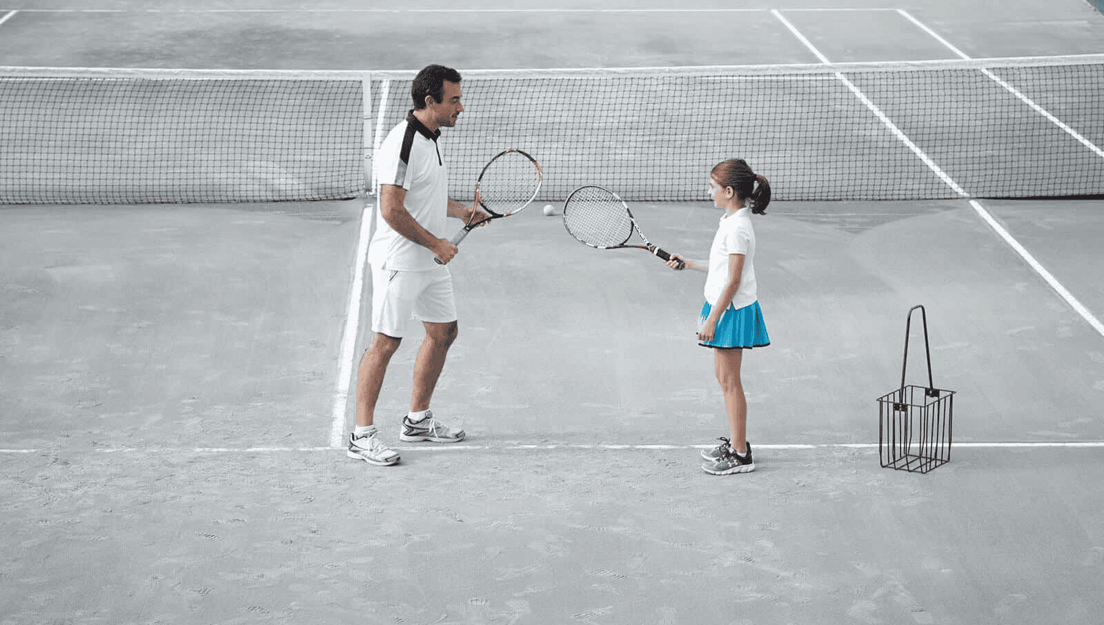 Young Girl in a Private Tennis Lesson