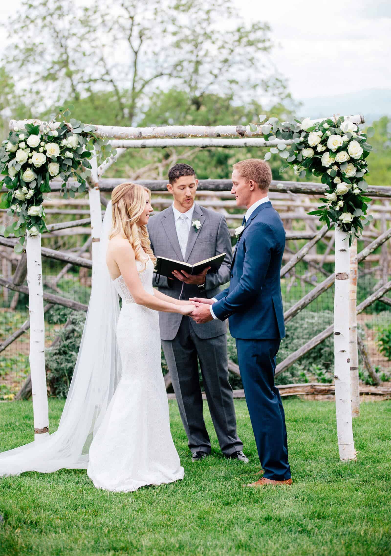 Wedding Photo of Kelly and Nick at the Alter