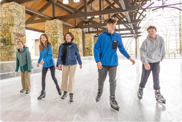Teens Ice Skating at Our Mountain Resort in Upstate New York