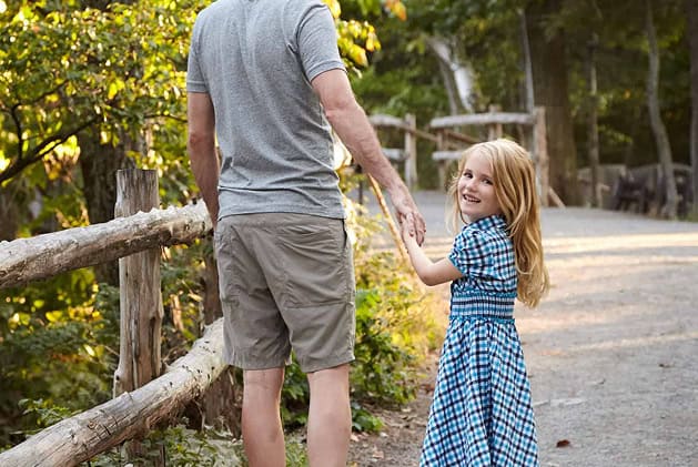 Young Girl on a Walk with Her Father at Our New York State Family Resort