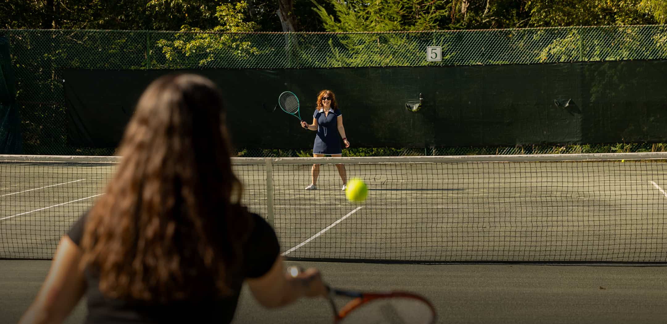 Women Enjoying a Tennis Match at Our Historic, Catskills Resort